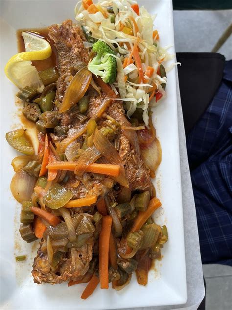 Triple deuce restaurant & grill photos  Indulge in Caribbean flavors: Triple Deuce offers an authentic taste of Caribbean cuisine